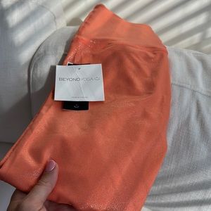 Orange shine leggings size small
